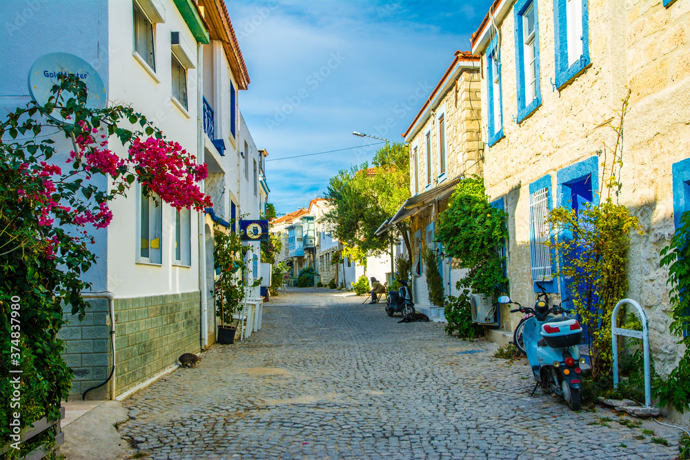 Wall mural alacati street view in alacati town. alacati is populer historical tourist destination in turkey.