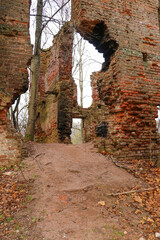 An old abandoned ruined red brick building. Wars and earthquakes.