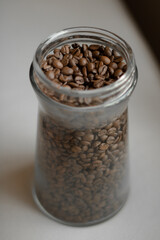 brown coffee beans in a coffee can