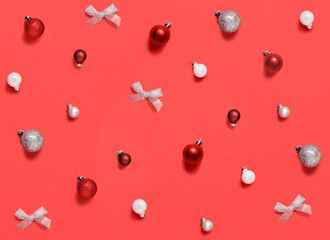Christmas decorations and baubles on a red background