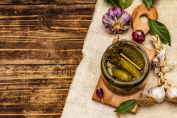 Marinated pickled cucumbers with spices and herbs