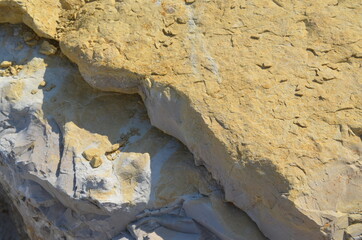 particular colored rocks illuminated by the sun