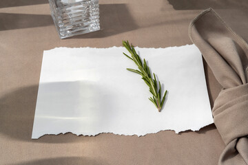 A plate with a white sheet on it. Wedding table with seating for guests.