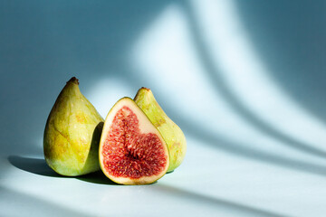 Fresh figs on a blue background