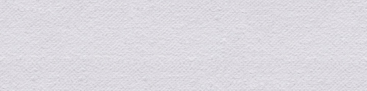 Linen canvas background in white color as part of your design work. Seamless panoramic texture.