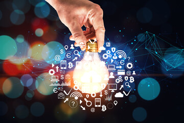 Hand holding  light bulb with social network interface