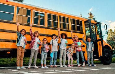 Children near school bus © Vasyl