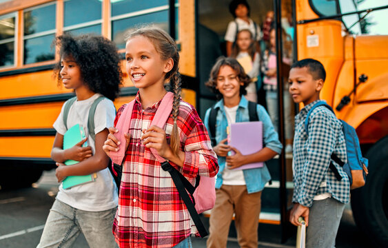 Children near school bus