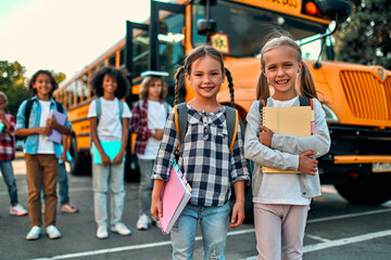 Children near school bus