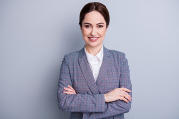 Photo of attractive confident business lady arms crossed beaming smile good mood skilled teacher profession occupation wear plaid suit jacket white shirt isolated grey color background
