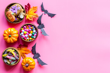 Halloween holiday banner design - pumpkins, cookies and autumn leaves, top view