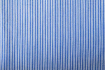 Fabric with small blue stripes. Texture