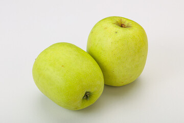 Two ripe green sweet apples