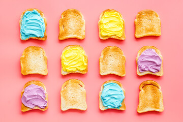 Colorful cheese spread on bread pattern, top view