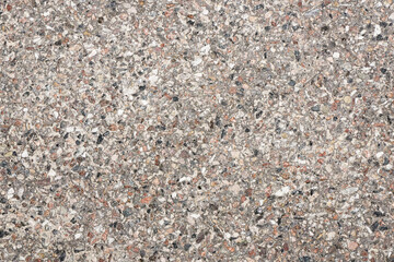 Rock pavement texture. Small stones ground background. Urban street structure.