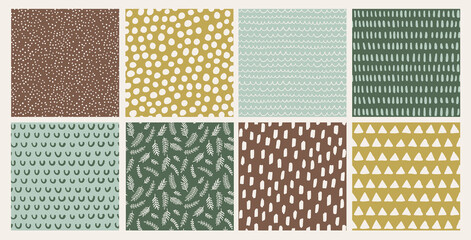 Set of hand drawn vector abstract doodle patterns winter, earthy tones. Seamless doodle backgrounds with  dots, branches, brush strokes, triangles.