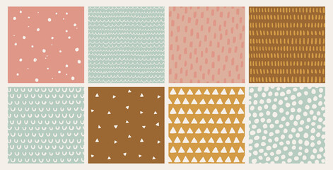 Hand drawn vector abstract doodle patterns in pink, mustard, brown. Seamless geometric backgrounds. Ink doodles. Stripes, dots, triangles, brush strokes.  - 374851795