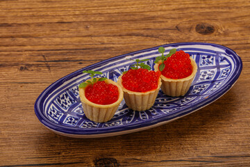 Apetizer - tartlet with red caviar