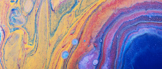 Modern fluid art. Abstract colorful background with swirl of acrylic pouring paints.