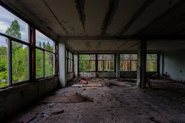 Dark abandoned industrial or office building interior