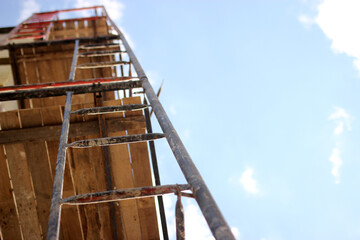 scaffolding on a blue sky background, bottom view