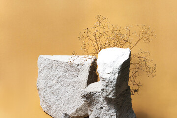Natural stone, concrete podium for cosmetics or products on brown beige background with copy space....