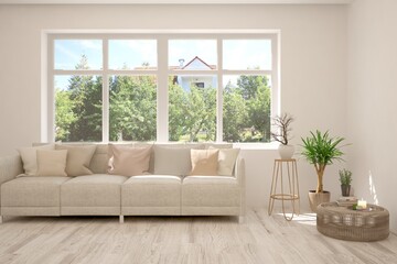 White living room with sofa and summer landscape in window. Scandinavian interior design. 3D illustration