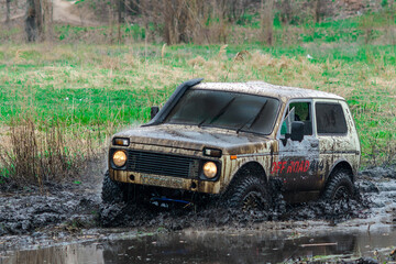 Off roading UTV in wet environment. Competition, fast.