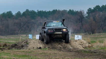 Obraz na płótnie Canvas Off Road vehicle in the action in dirt