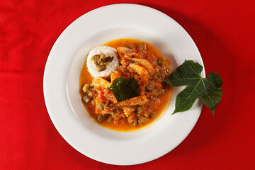 Shrimp with caper, chaya leaf and steamed rice.