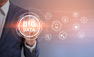 Big Data. Unrecognizable businessman pressing button on digital screen with virtual icons