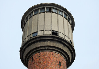 Fototapeta na wymiar built in 1956, a water tower, also known as the water tower, near Fasty in Podlasie, Poland