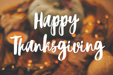 Happy Thanksgiving greeting card. Hand written Happy Thanksgiving text on blurred background of...