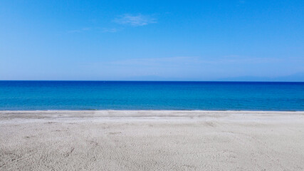 Aerial view of empty tropic sand beach and blue sea 