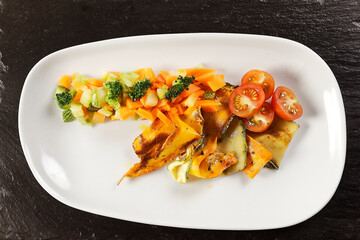 Pumpkin mousse with roasted vegetables, steamed red rice, and baked potatoes with cream and ham.