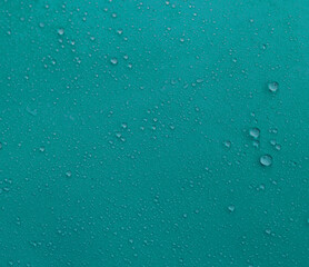 Water drops on a blue background. Clean water