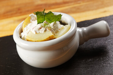 Pumpkin mousse with roasted vegetables, steamed red rice, and baked potatoes with cream and ham.