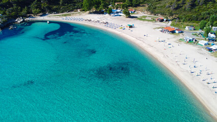 Aerial view of empty tropic sand beach and blue sea 