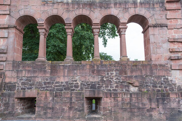 Preserved wall with arcaded windows in the imperial palace in Gelnhausen / Germany