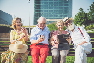 Group of seniors  having fun in the city