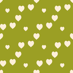 Seamless pattern with light yellow hearts on discreet green background. Vector image.