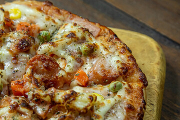 pizza on wood table close up image  for food content.