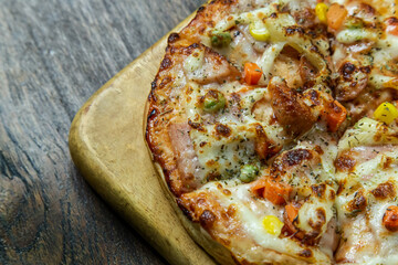 pizza on wood table close up image  for food content.