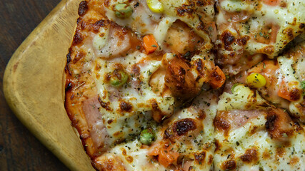 pizza on wood table close up image  for food content.