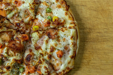 pizza on wood table close up image  for food content.