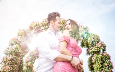 Happy couple spending time in a flower park