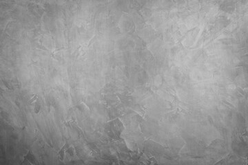 Abstract background of modern loft cement texture. The gray concrete wall has some scratch without a fixed pattern. Can be used in graphic design and for creating various backgrounds.