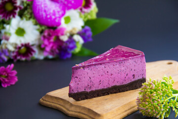 Homemade cheesecake with fresh blueberries and mint for dessert - healthy organic summer dessert pie cheesecake. Creative atmospheric decoration.v