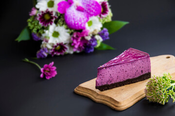 Obraz na płótnie Canvas Homemade cheesecake with fresh blueberries and mint for dessert - healthy organic summer dessert pie cheesecake. Creative atmospheric decoration.v