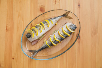Mackerel or scomber with lemon. Raw fish ready to prepare